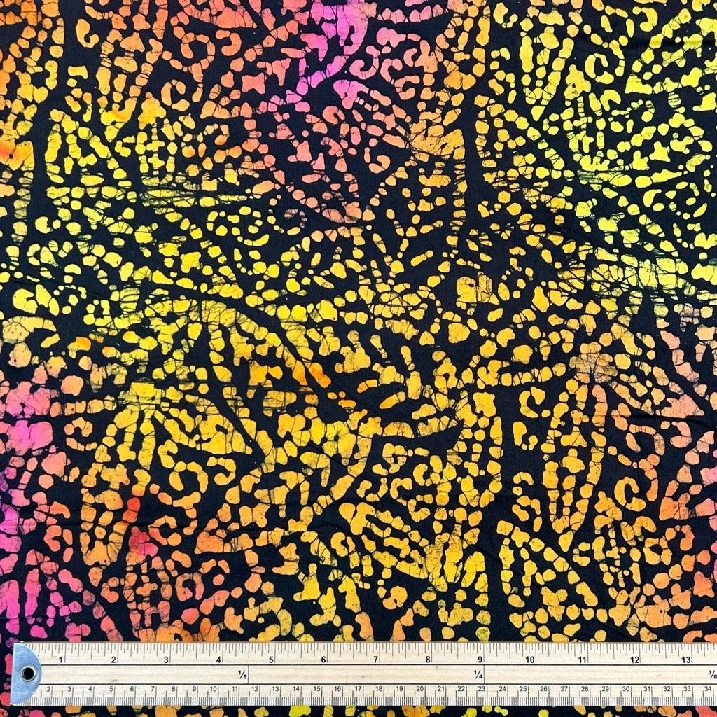 John Louden Black Cotton Batik Fabric with Multicoloured Leaves and Swirls 2 John Louden Black Cotton Batik Fabric with Multicoloured Leaves and Swirls - Image 2