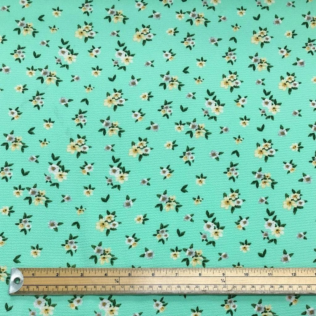 Yellow and White Daisy Floral Print on Mint Green Bubble Crepe Fabric 2 Yellow and White Daisy Floral Print on Mint Green Bubble Crepe Fabric - Image 2