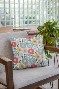 Large Cartoon Floral White Panama Fabric - 100% Cotton Canvas 13 Large Cartoon Floral White Panama Fabric - 100% Cotton Canvas -Pound Fabrics Sale Store mockup of a pillow on an armchair 23550 7