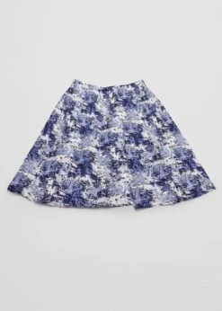 Distressed Print Crepe Fabric - High-Quality Polyester Dressmaking Material -Pound Fabrics Sale Store mockup of a skater skirt flat laid over a surface m30573 1